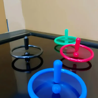 Plovoucí gyroskop s vykřičníkem, zelený